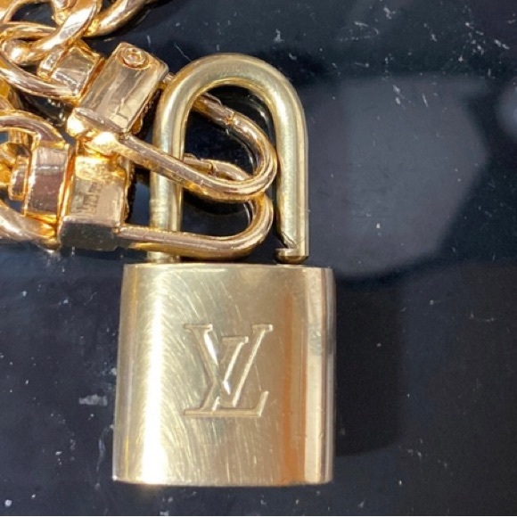 Authentic Louis Vuitton Lock on Charmed chain - Picture 5 of 6